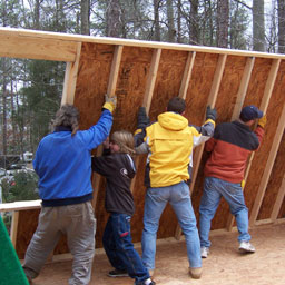 Old fashioned wall raising?